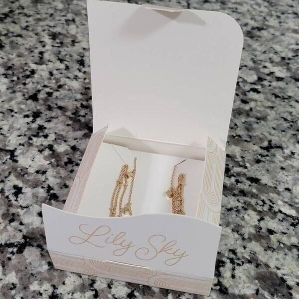 Pair‎ of gold layering bracelets